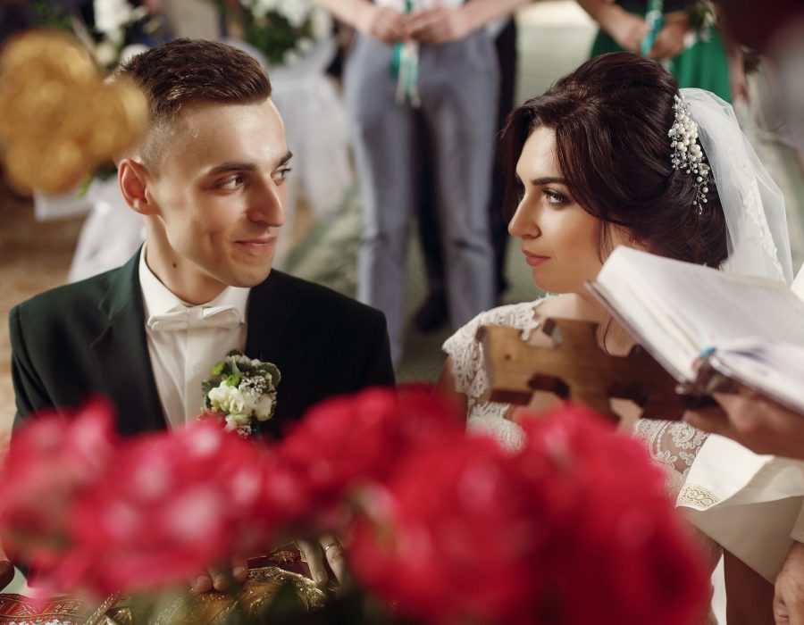 emotional-couple-at-wedding-ceremony-in-christian-catholic-church-1.jpg